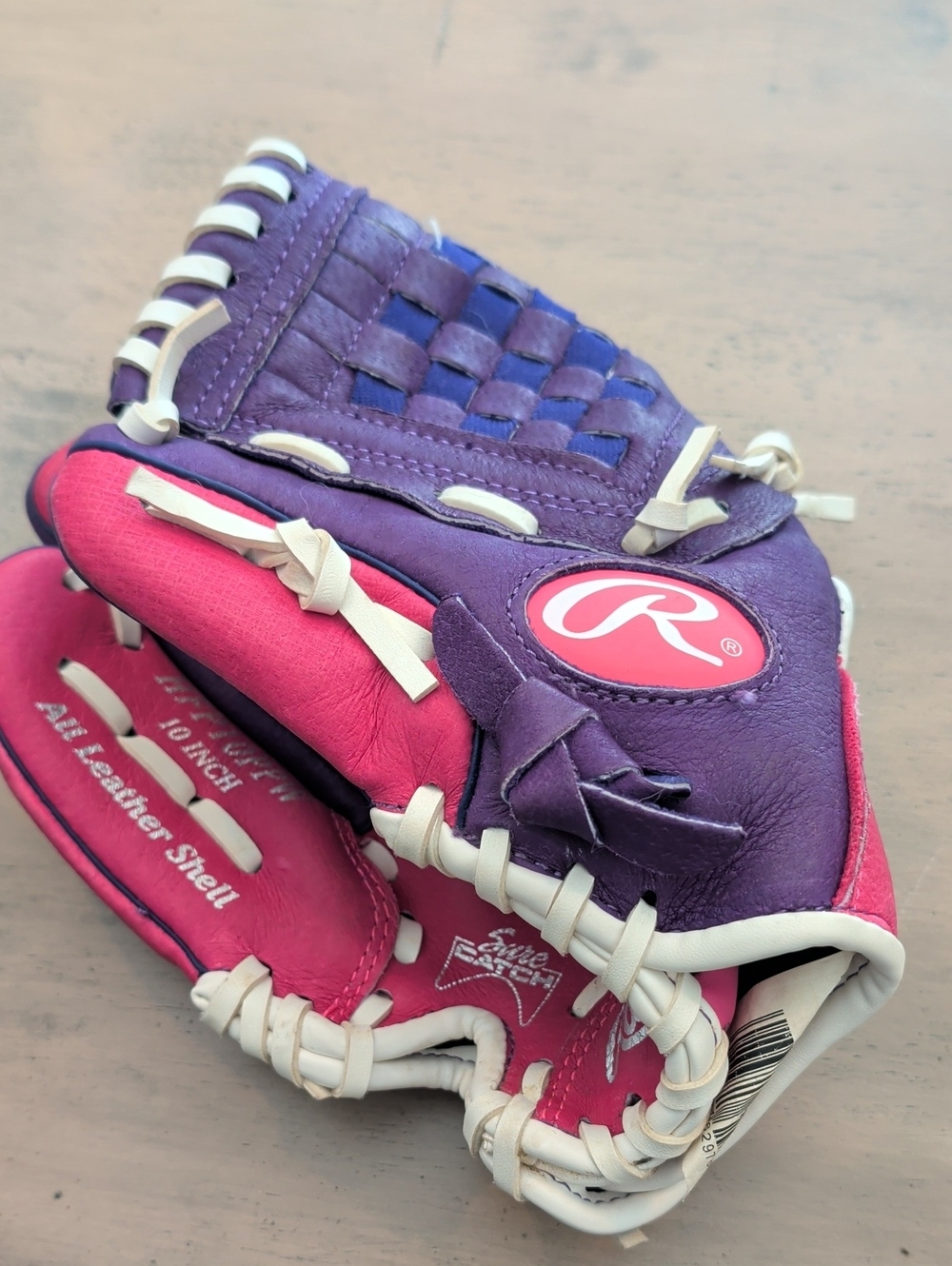 Rawlings Purple and Pink Kids Baseball Glove with White Lacing